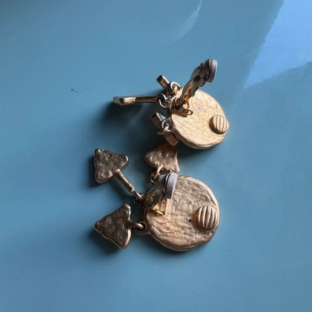Vintage cream enamel and gold tone clip on dangle earrings